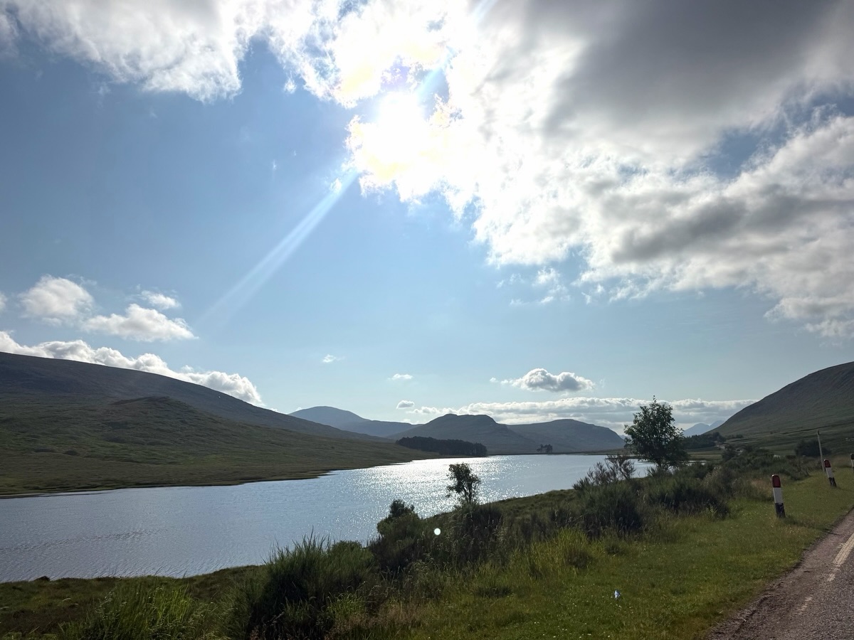 Meghan also included sweeping countryside scenery from the family's travels. The peaceful landscape added a reflective note before the carousel's more personal images. | Source: Instagram/meghan