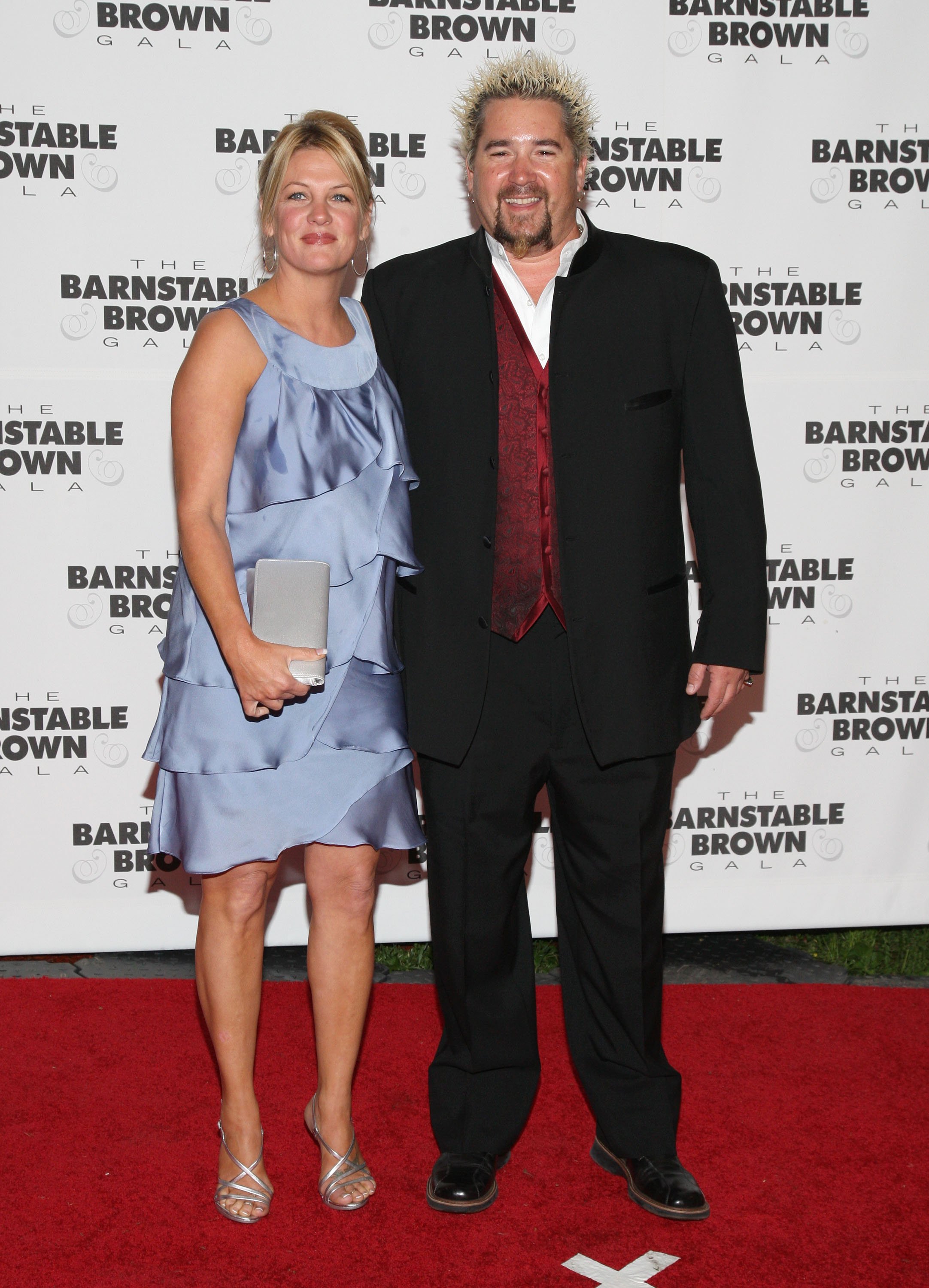 Lori Fieri and Guy Fieri pose on the red carpet at the Barnstable Brown Party Celebrating The 135th Kentucky Derby on May 1, 2009 in Louisville | Source: Getty Images