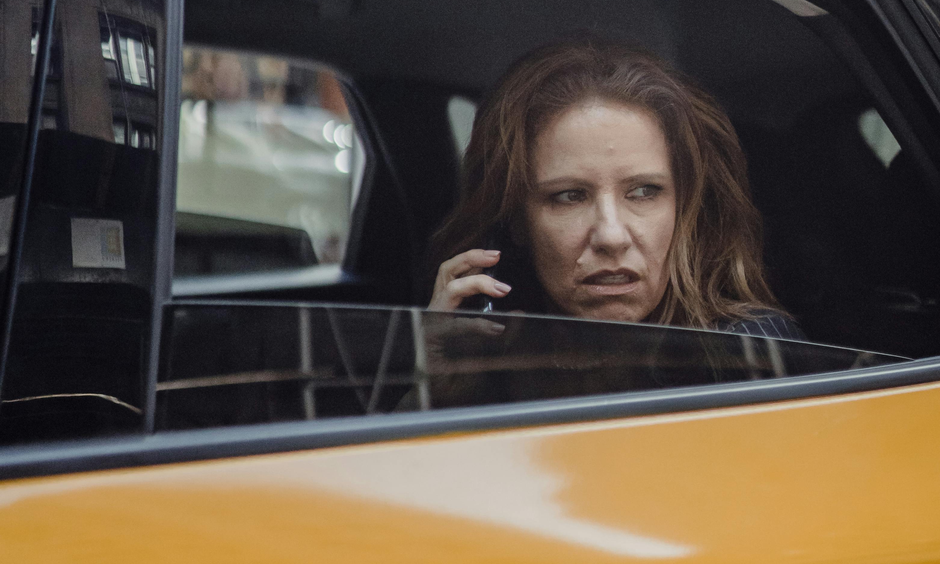Olivia makes a phone call to her mother from the back of the taxi | Source: Pexels
