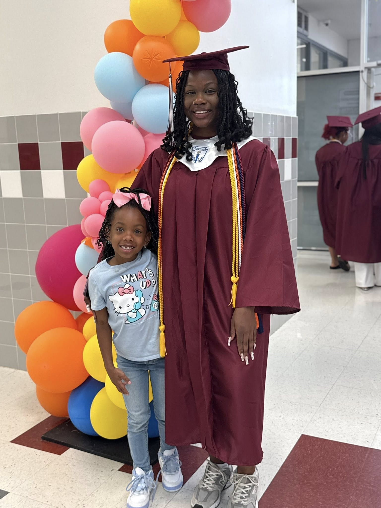 Courtney Hodge, and her sister Carter, at her graduation, on a photo posted on September 25, 2025 | Source: Facebook/Sherqueena Myles Jackson