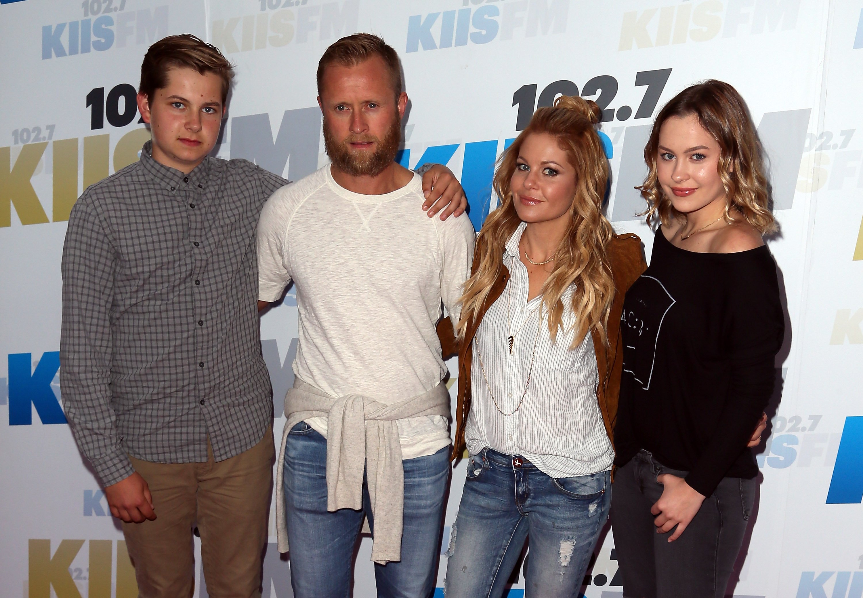 Former NHL player Valeri Bure (LC), actress Candace Cameron-Bure (RC) and their children attend 102.7 KIIS FM's 2016 Wango Tango at StubHub Center on May 14, 2016 in Carson, California. | Source: Getty Images
