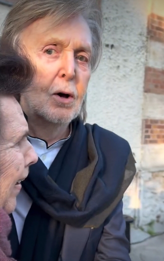 Paul McCartney wrapped an arm warmly around a companion as he stood outside a Paris venue during Fashion Week, appearing relaxed and engaged in conversation. His longer, swept-back hair and light stubble were clearly visible, lending him a softer, more informal look than usual. The image, taken from a post dated 4 March 2026, captures a candid, affectionate moment amid the buzz of the event. | Source: Instagram/suzymenkes