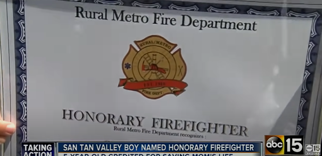 Salvatore Cicalese's honorary firefighter certificate from the Rural Metro Fire Department for helping save his mother's life in an April 15, 2014, YouTube clip | Source: YouTube/ABC15 Arizona