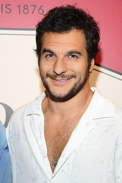Amir Haddad assiste à l'événement cocktail Lancel 'Portraits De Fantaisie' lors de la Fashion Week de Paris.|Photo : Getty Images