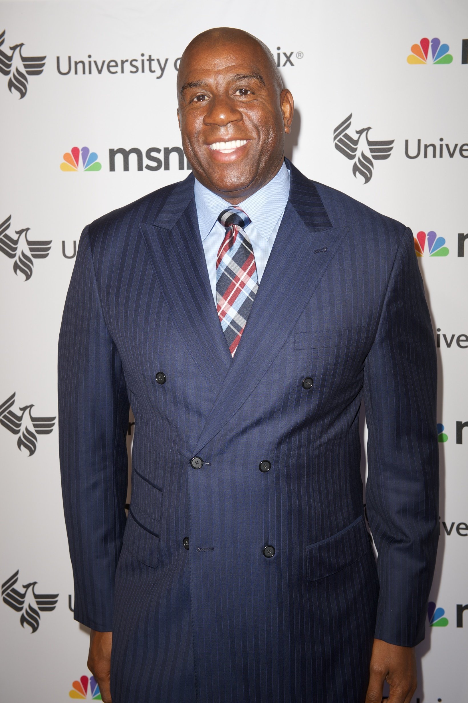 NBA star Magic Johnson attending "Advancing the Dream" live at the Apollo Theater on September 2013. | Photo: Getty Images