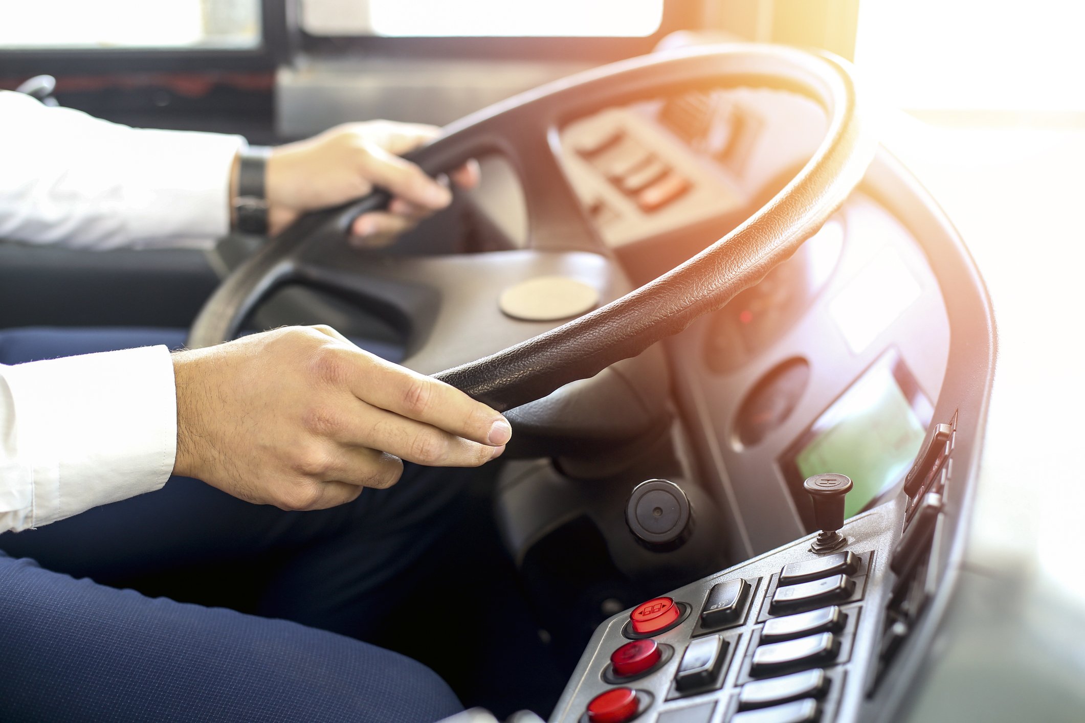 A Caucasian man driving a bus. | Photo: Getty Images