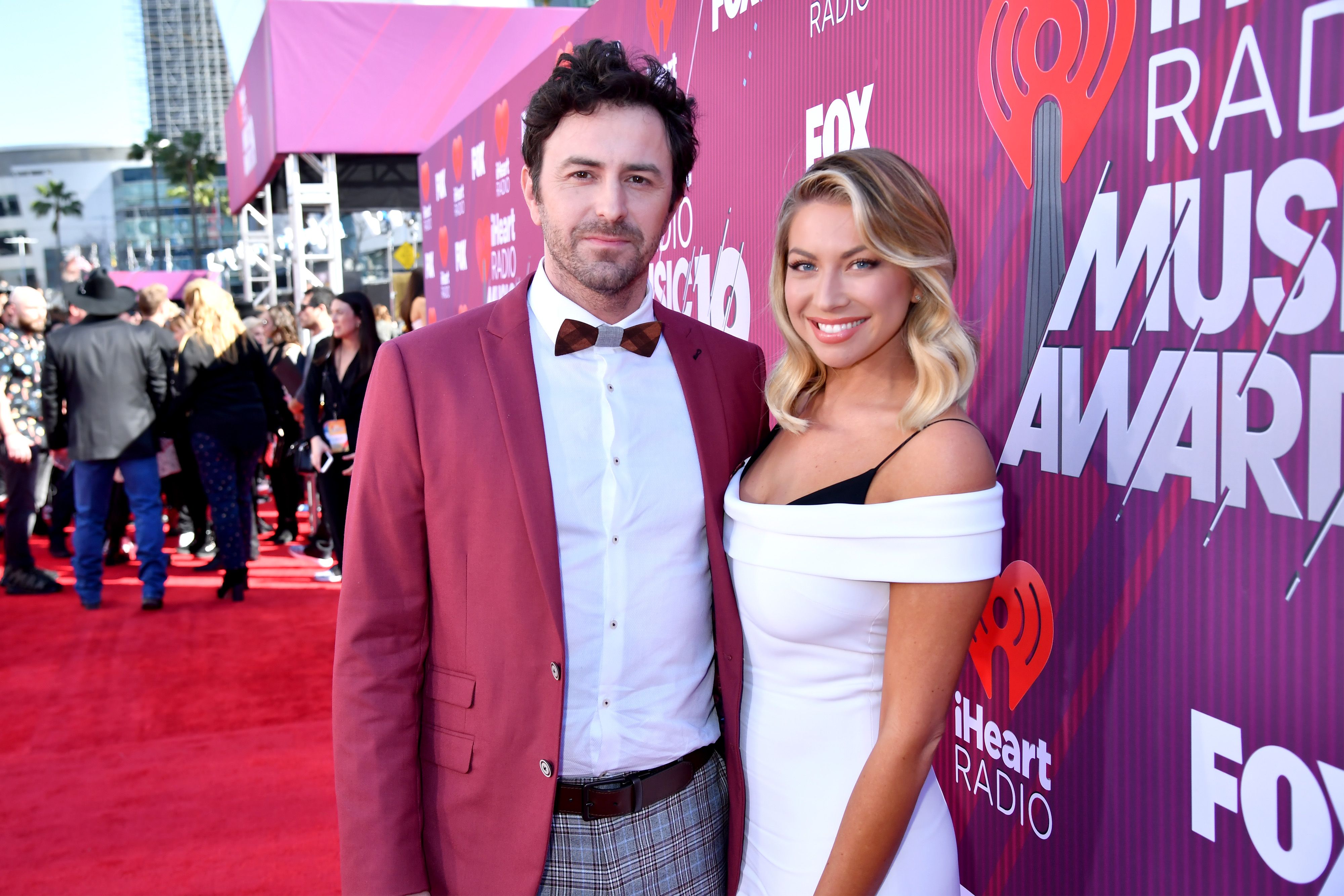 Beau Clark and Stassi Schroeder at the 2019 iHeartRadio Music Awards at the Microsoft Theater in Los Angeles, California | Photo: Jeff Kravitz/2019 iHeartMedia