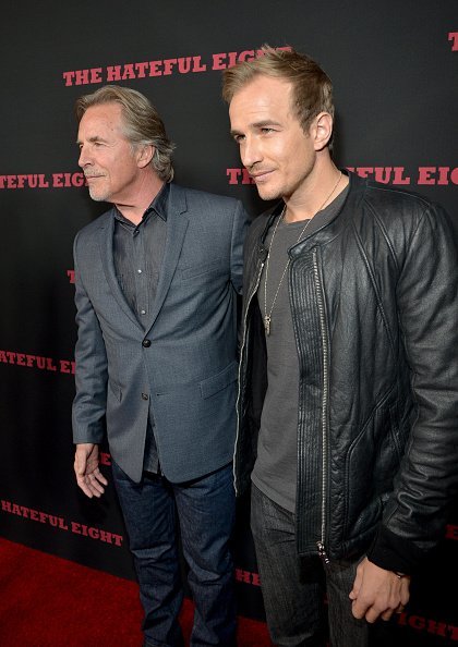 Don Johnson (L) and Jesse Johnson attend the world premiere of "The Hateful Eight" presented by The Weinstein Company at ArcLight Cinemas Cinerama Dome on December 7, 2015, in Hollywood, California. | Source: Getty Images.
