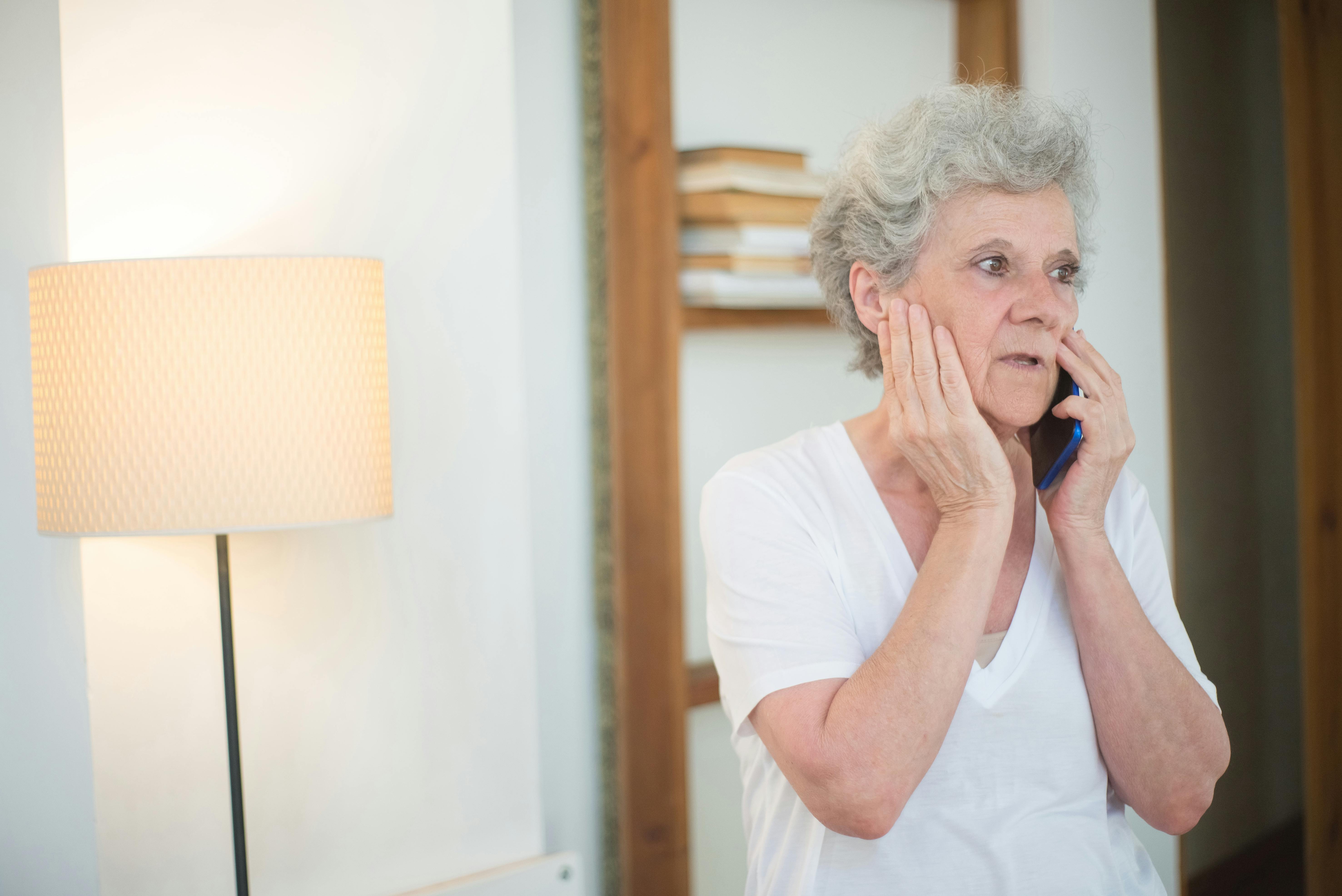 An elderly woman on a phone call | Source: Pexels