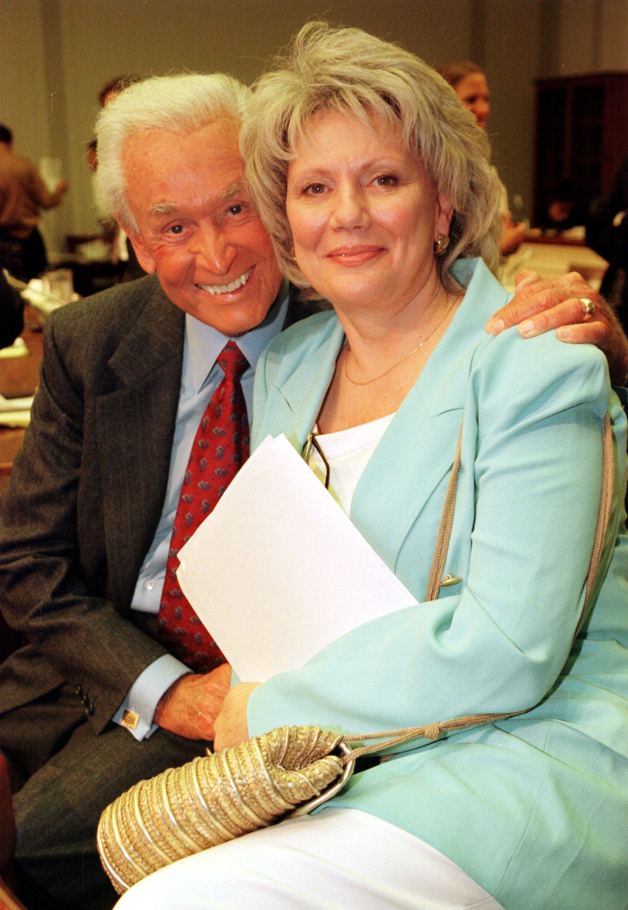 Bob Barker poses for photographers with Nancy Burnet, Director of United Activists for Animal Rights, after a hearing on the "Captive Elephant Accident Prevention Act of 1999" on June 13, 2000 at Capitol Hill in Washington, D.C. | Source: Getty Images