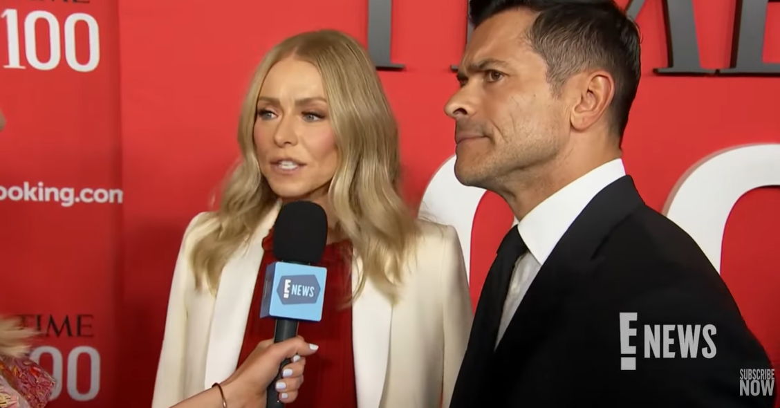 A screenshot of Kelly Ripa and Mark Consuelos during an E! News interview on April 26, 2024. | Source: YouTube.com/enews