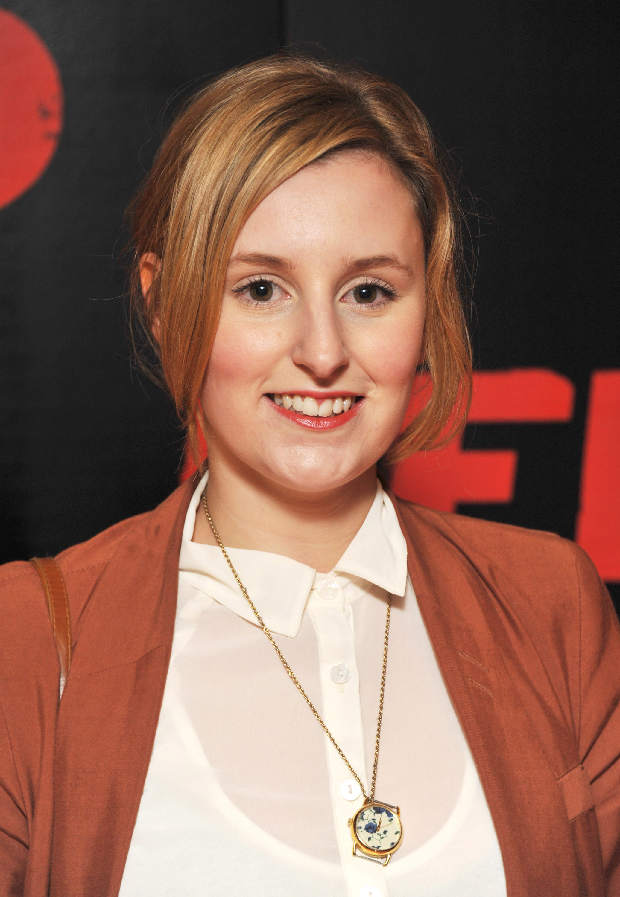 Laura Carmichael attended the premiere of "Red" in 2010 with a fresh-faced look and casual styling. Her light makeup, side-swept hair, and warm-toned blazer over a sheer white blouse gave off a relaxed, girl-next-door charm that contrasted with the formality of her "Downton Abbey" character.