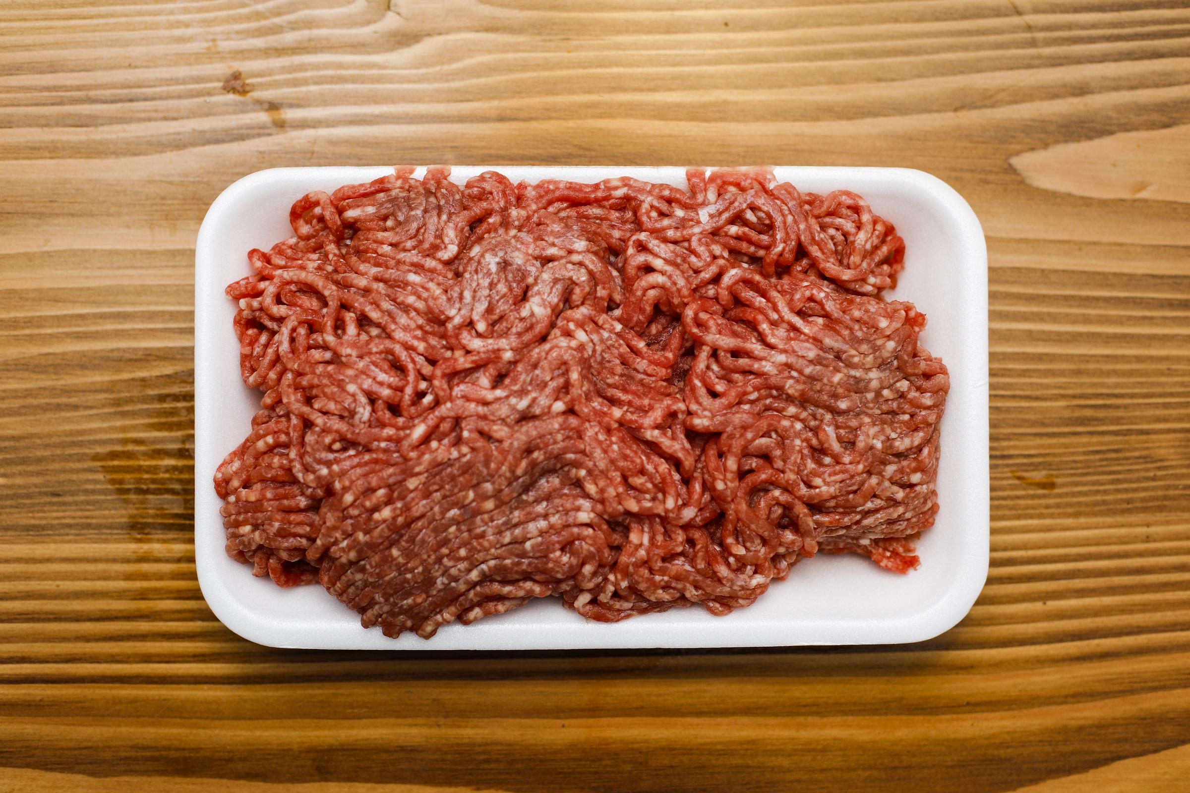 Ground Beef on a wooden table | Source: Getty Images