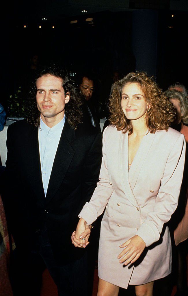 An undated picture of actor Jason Patric and Julia Roberts attending premiere of "Rush" | Photo: Getty Images