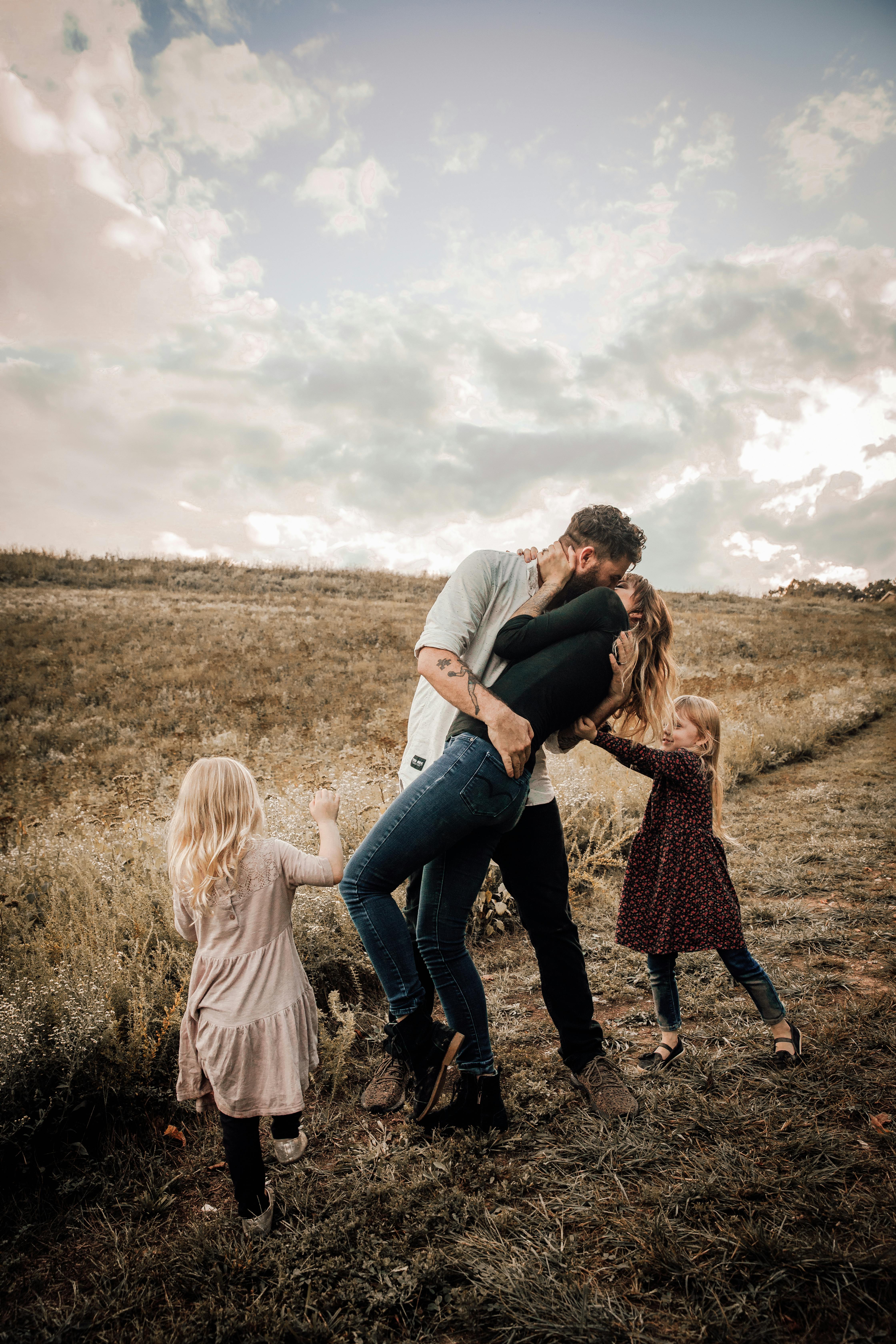 A happy family spending time outdoors. For illustration purposes only | Source: Pexels