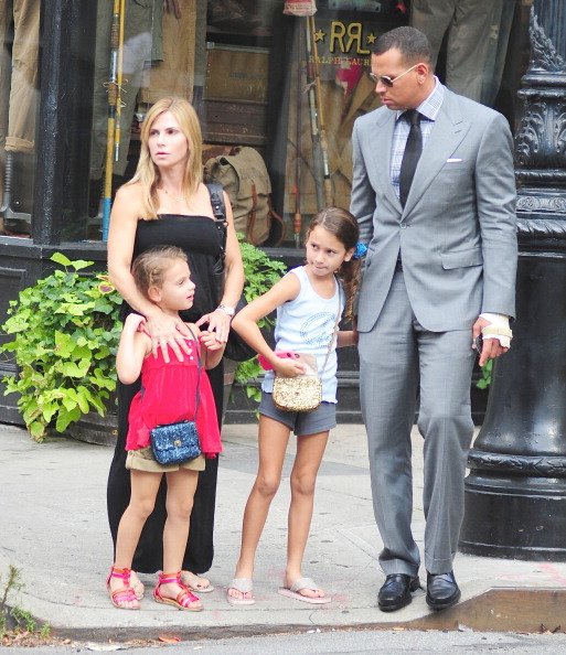 Alex Rodriguez and Cynthia Scurtis are seen with their daughters Ella Rodriguez and Natasha Rodriguez in the West Village on August 2, 2012 in New York City | Photo: Getty Images 