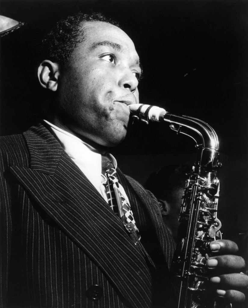 Portrait photo of Charlie Parker playing a saxophone circa 1940. | Photo: Getty Images