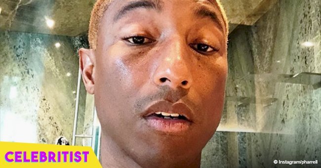 Pharrell Williams shares photo with wife in long jacket after speaking out about their triplets