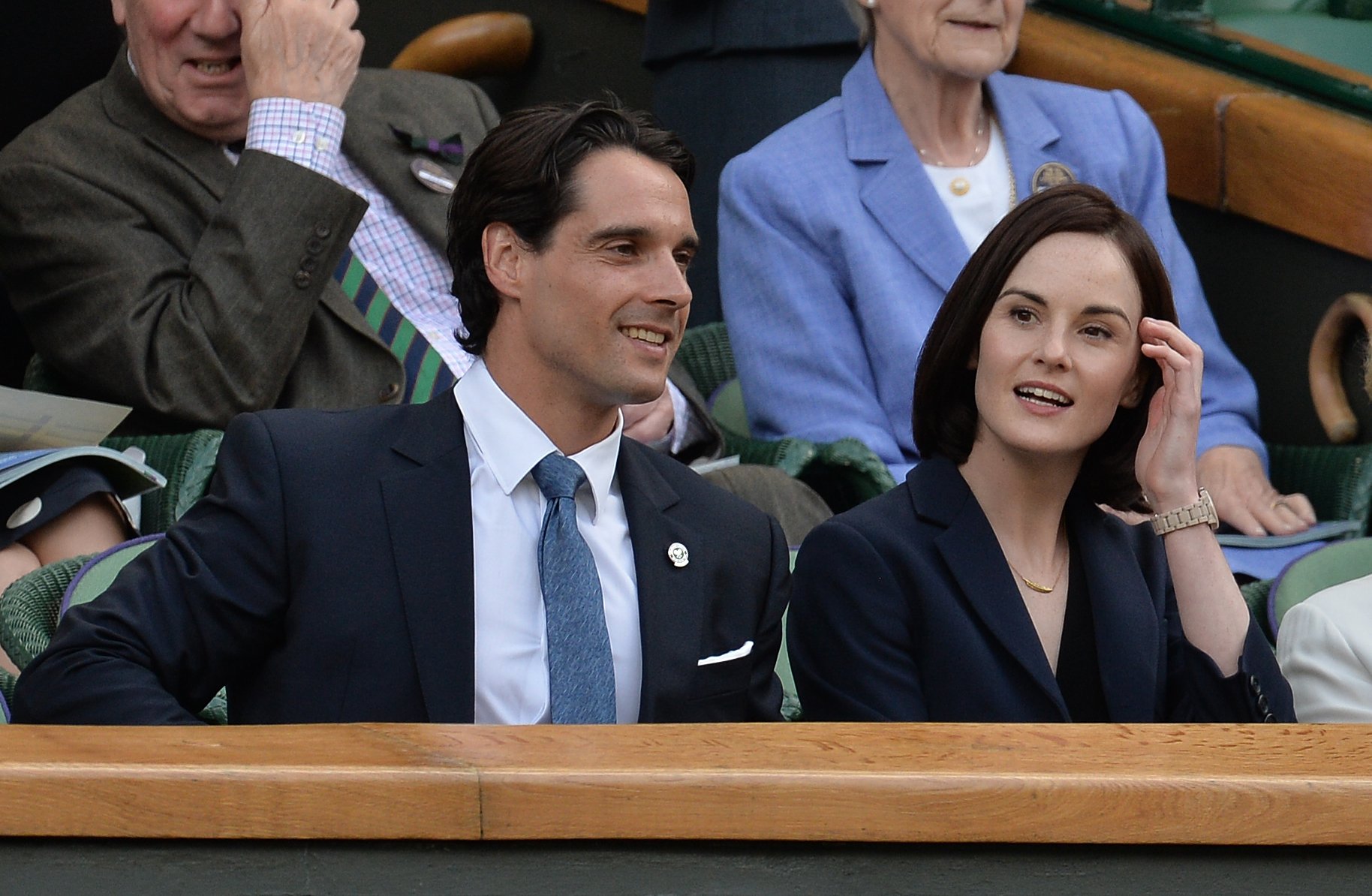 Michelle Dockery and John Dineen at the Lukas Rosol v Rafael Nadal match on centre court at Wimbledon on June 26, 2014 | Source: Getty Images