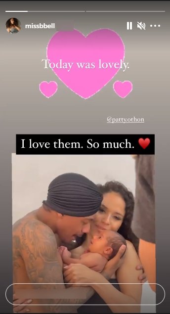 Nick Cannon and Brittany Bell locked in an embrace and doting on their new born, Powerful. | Photo: Instagram/Missbbell