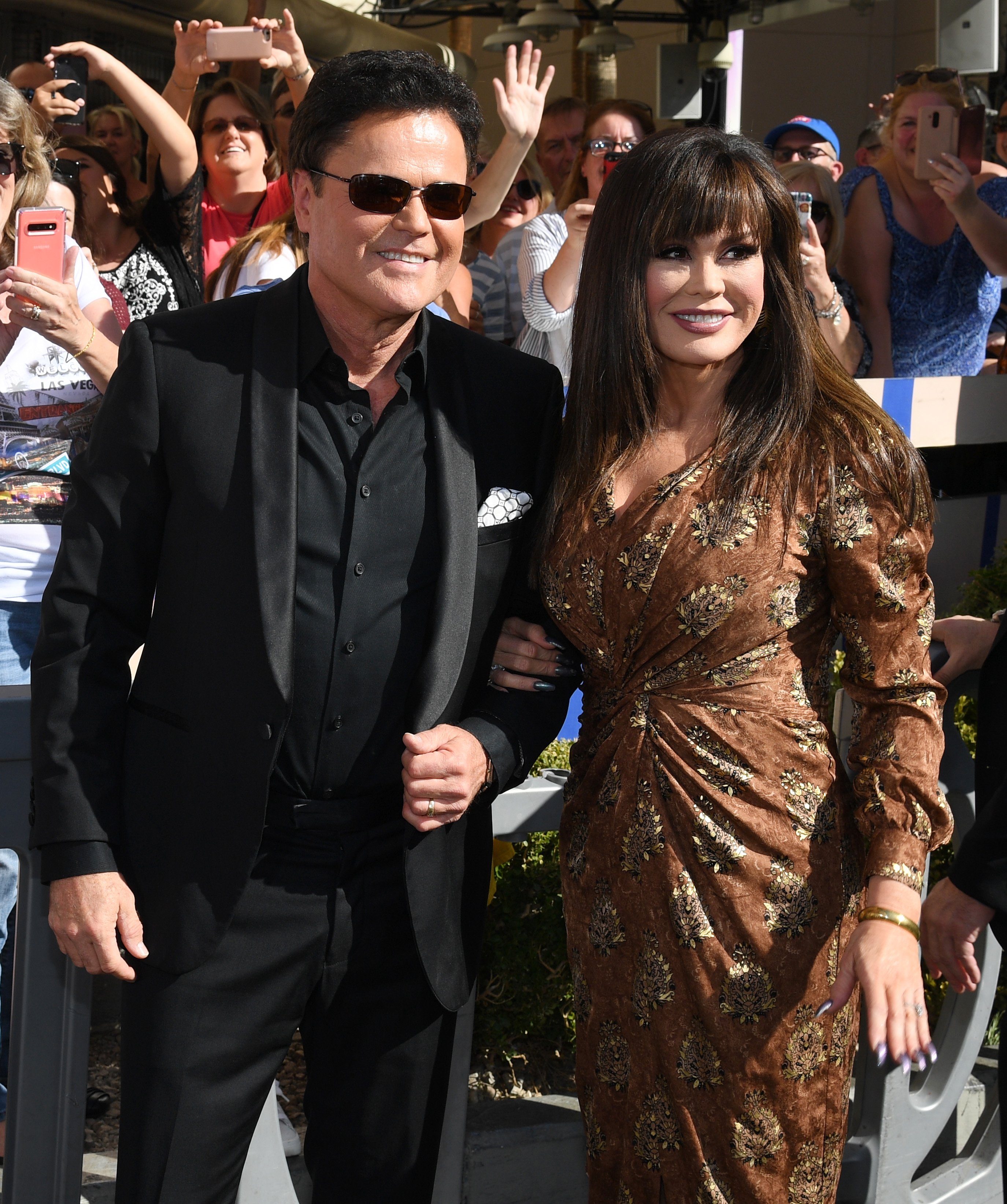 Donny Osmond and Marie Osmond at the unveiling of their star from the Las Vegas Walk of Stars outside Flamingo Las Vegas on October 4, 2019 | Source: Getty Images