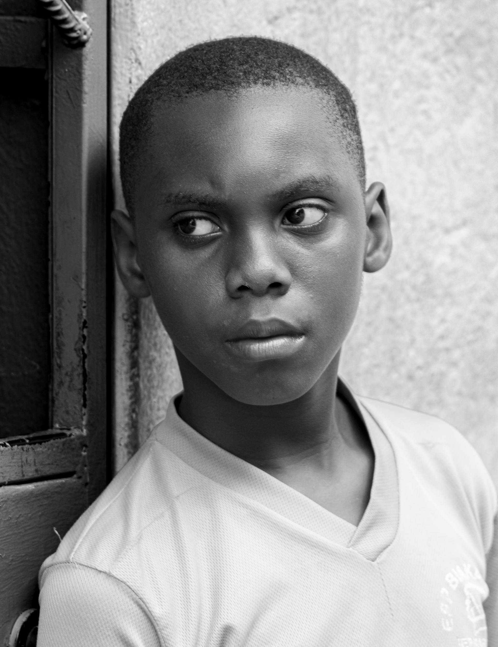 A boy with a serious face | Source: Unsplash