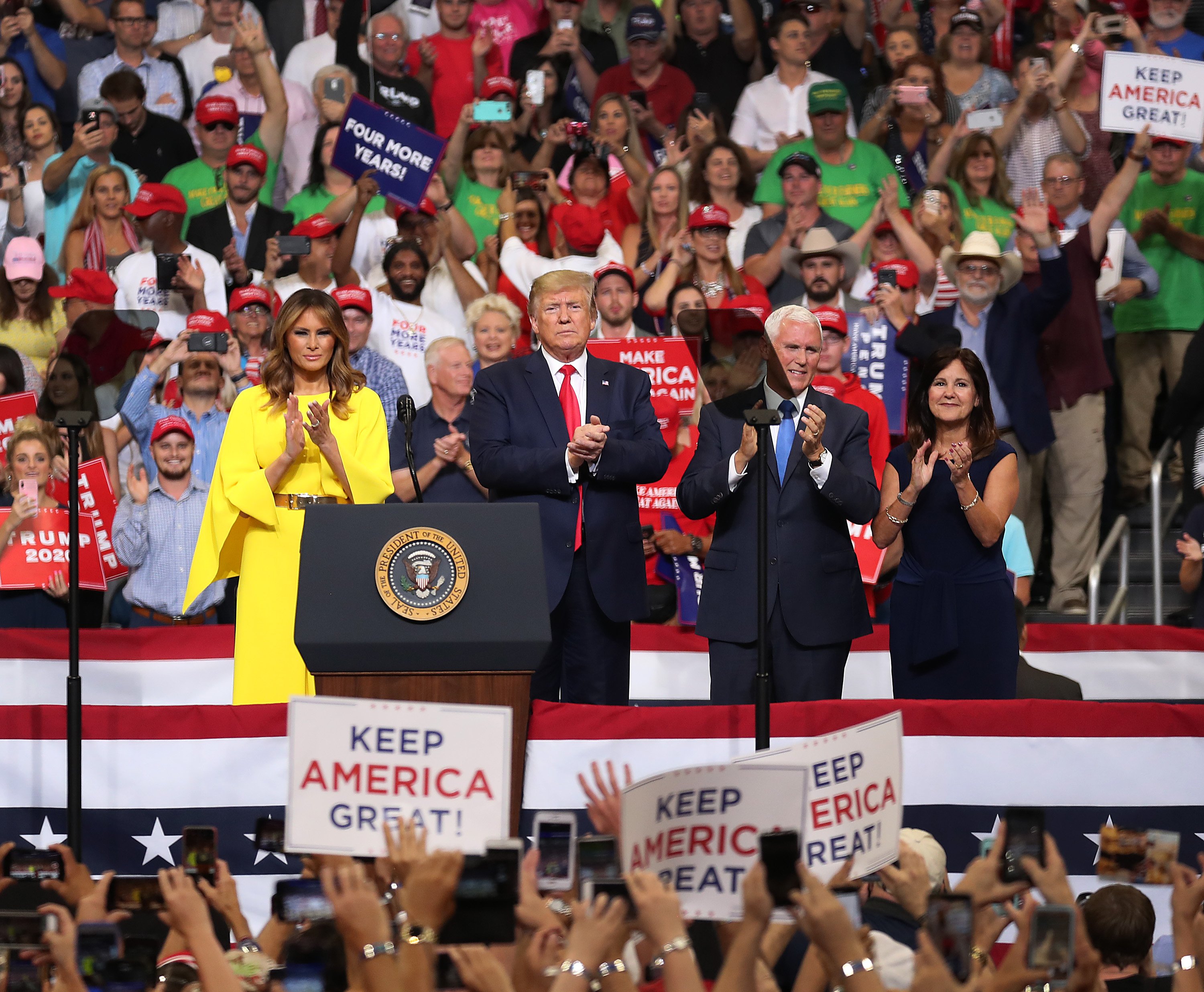Donald Trump, Melania Trump, Mike Pence and his wife, Karen Pence, at the Amway Center in Orlando, Florida | Photo: Getty Images