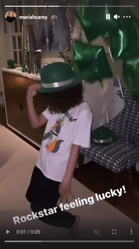 Mariah Carey's son, Moroccan Scott, seen donning a green hat while dancing | Photo: Instagram/mariahcarey