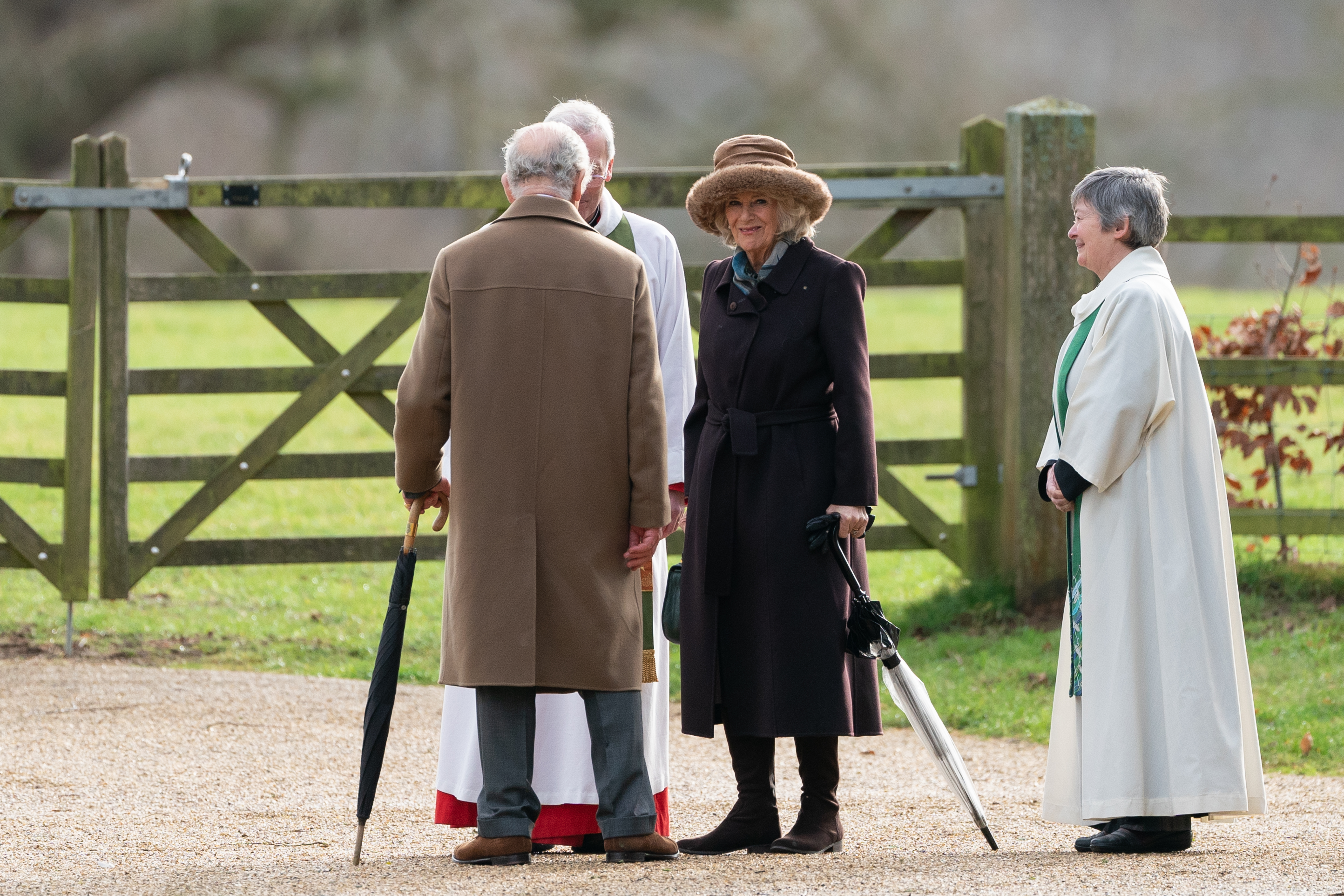 King Charles III, Queen Camilla, Reverend Canon Dr Paul Williams and another member of the church at Sunday church service at St Mary Magdalene Church in Sandringham, Norfolk on February 4, 2024 | Source: Getty Images
