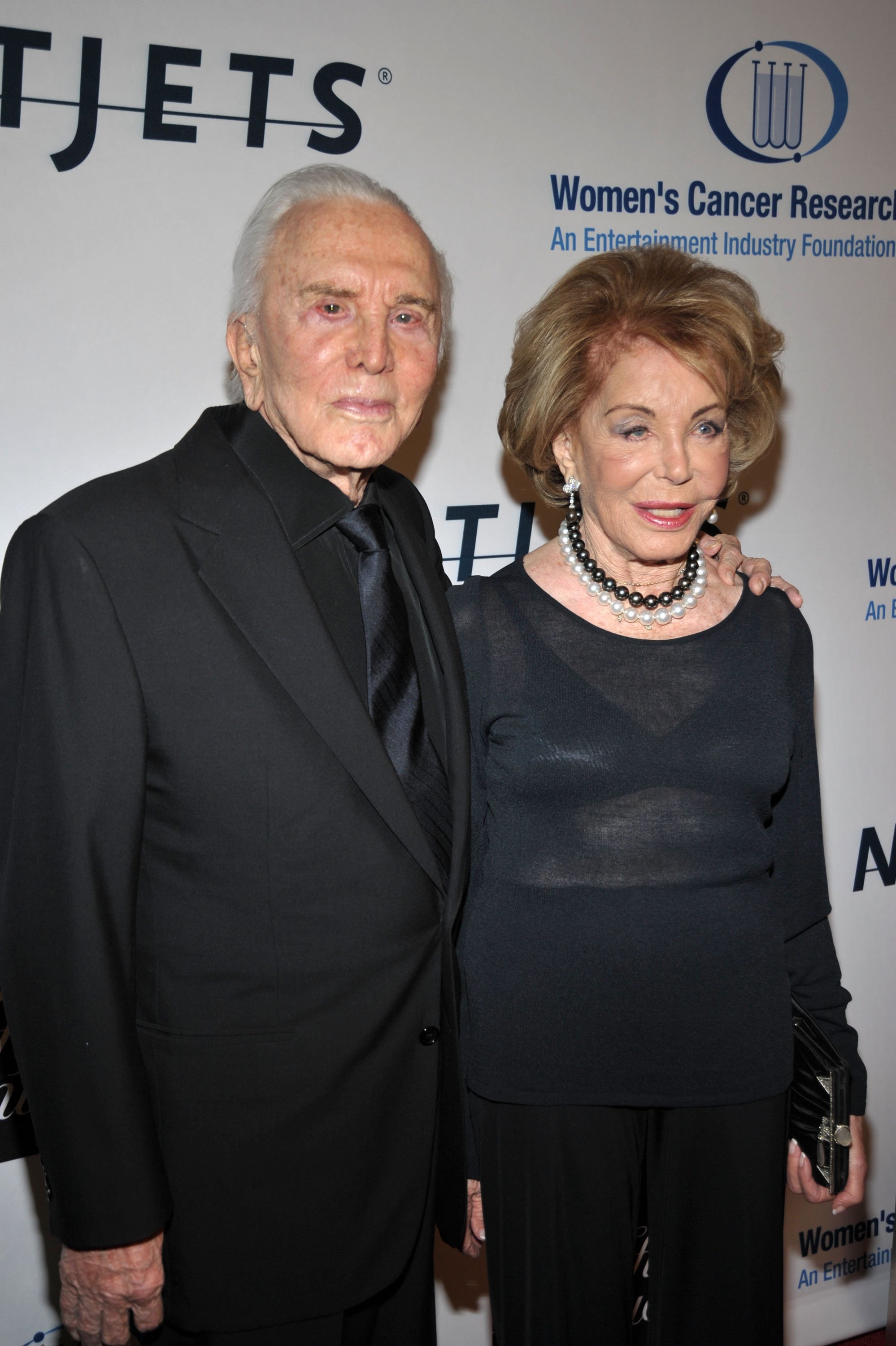 Kirk Douglas and wife Anne Buydens arriving at the 13th annual Unforgettable Evening at Beverly Wilshire Four Seasons Hotel on January 27, 2010 in Beverly Hills, California. | Source: Getty Images