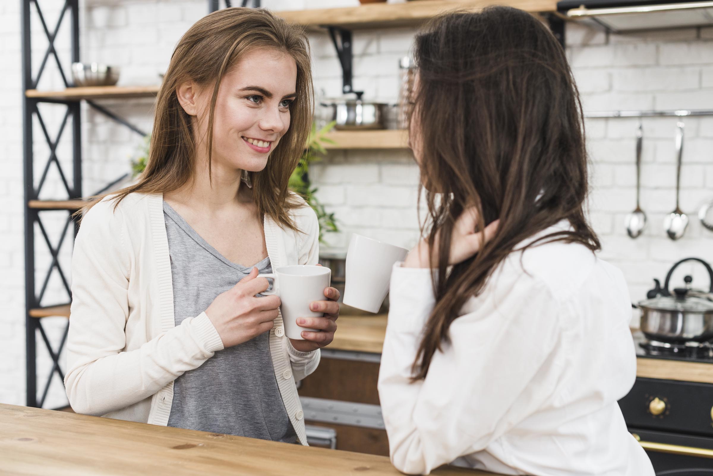 Two women chatting at home | Source: Freepik