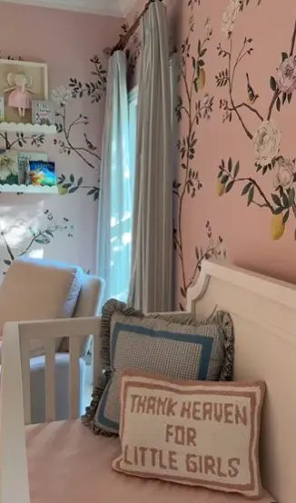 The crib area in Sofia's nursery is adorned with sweet pillows, including one that reads, "Thank heaven for little girls." The room's decor is full of heartwarming details, celebrating the joy of Alex's first baby. | Source: Instagram/alexmariedrum