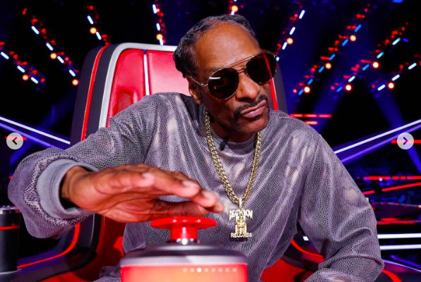 Snoop Dogg posing for a photo on "The Voice," posted on September 22, 2024 | Source: Instagram/nbcthevoice