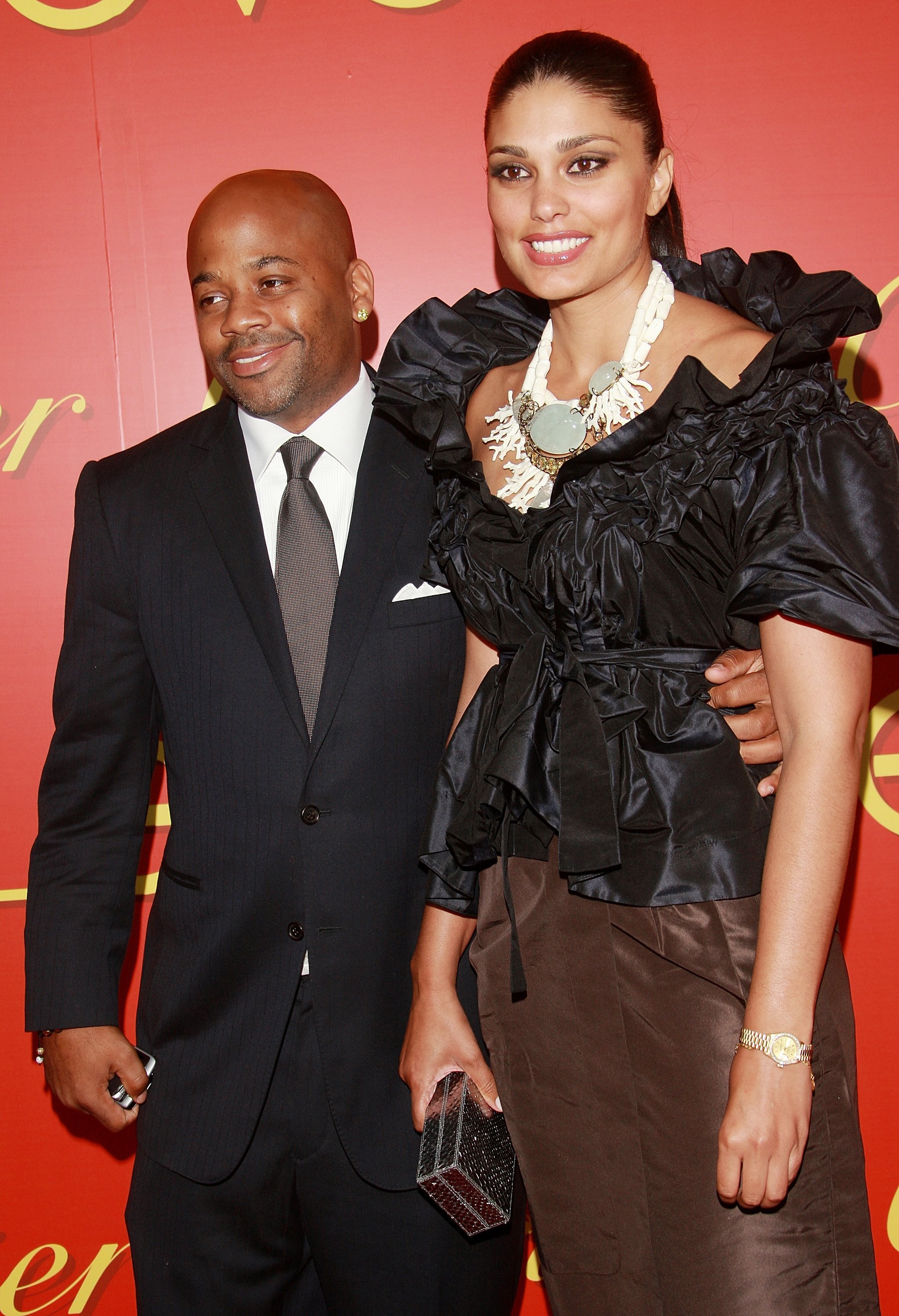 Damon Dash and Rachel Roy attend a cocktail party in celebration of The Cartier Charity Love Bracelet at The Cartier Mansion, June 7, 2007, in New York City. | Source: Getty Images.