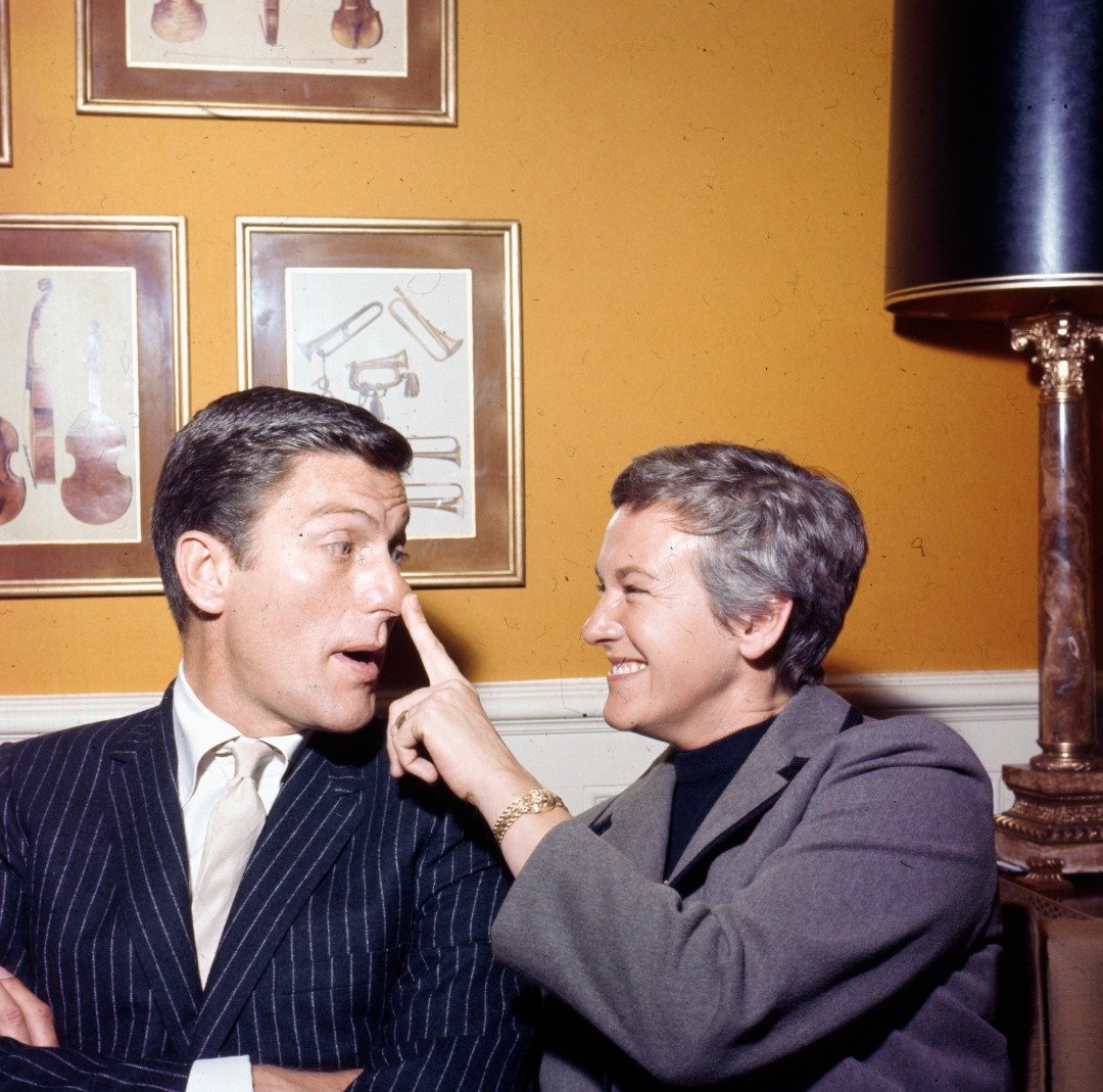 American actor Dick Van Dyke pictured with his wife Margie Willett in London in 1964. | Source: Getty Images