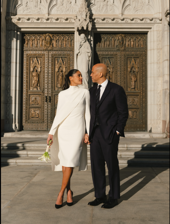 Cory Booker and Alexis Lewis gaze into each other's eyes on their wedding day, as seen from a post dated November 30, 2025. | Source: Facebook/CoryBooker