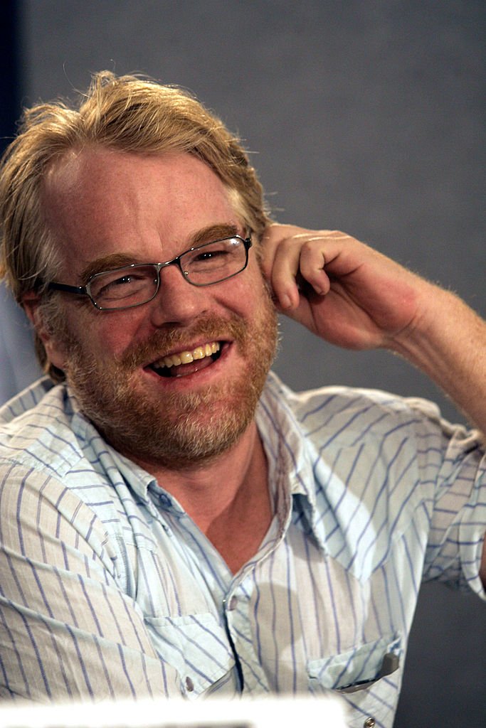 Philip Seymour Hoffman gestures as he attends a media conference at the Toronto International Film Festival for the film "Capote" on September 11, 2005 | Photo: Getty Images
