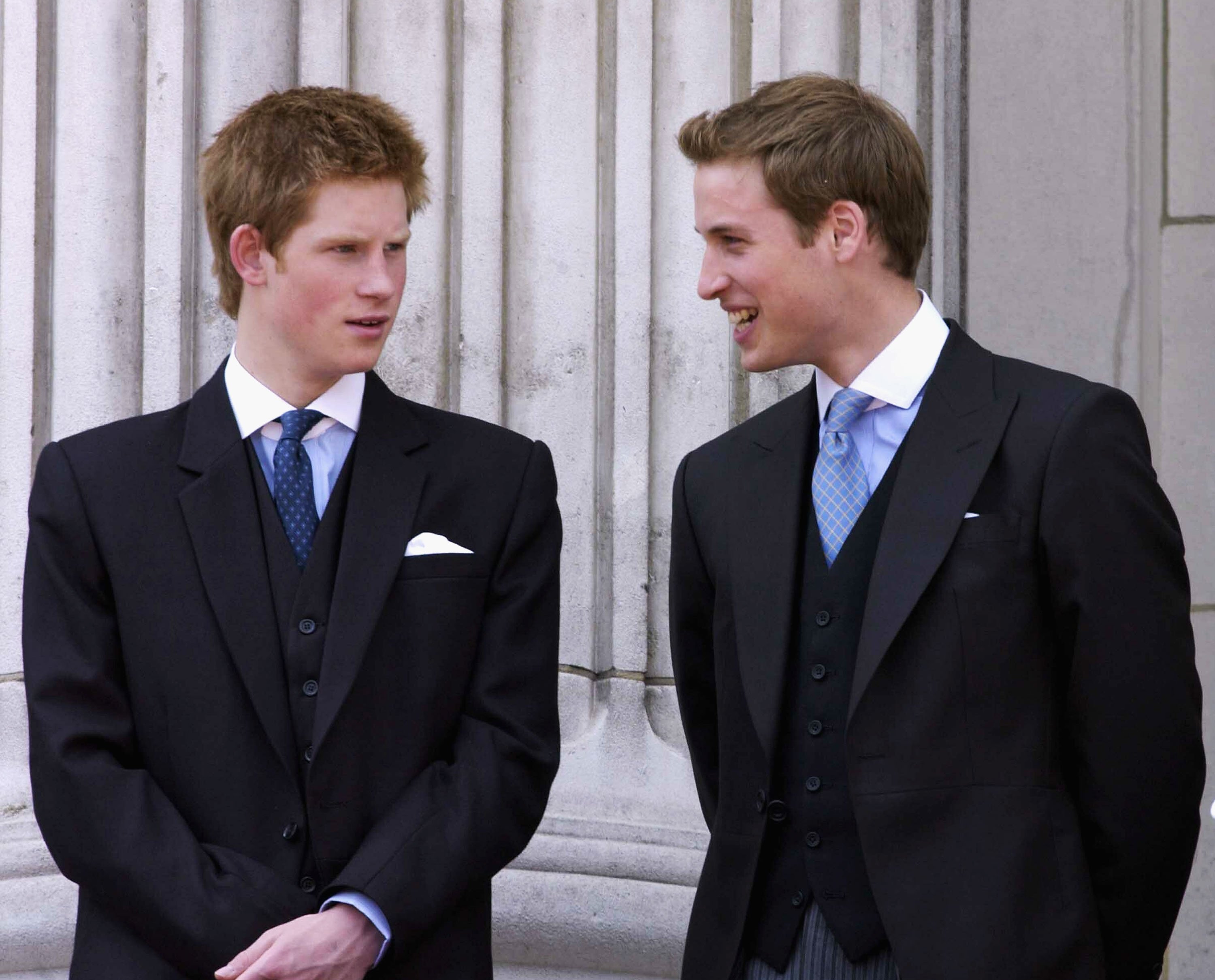 Prince William and Prince Harry on the balcony at Buckingham Palace on June 14, 2003, after Trooping the Colour in London, England. | Source: Getty Images