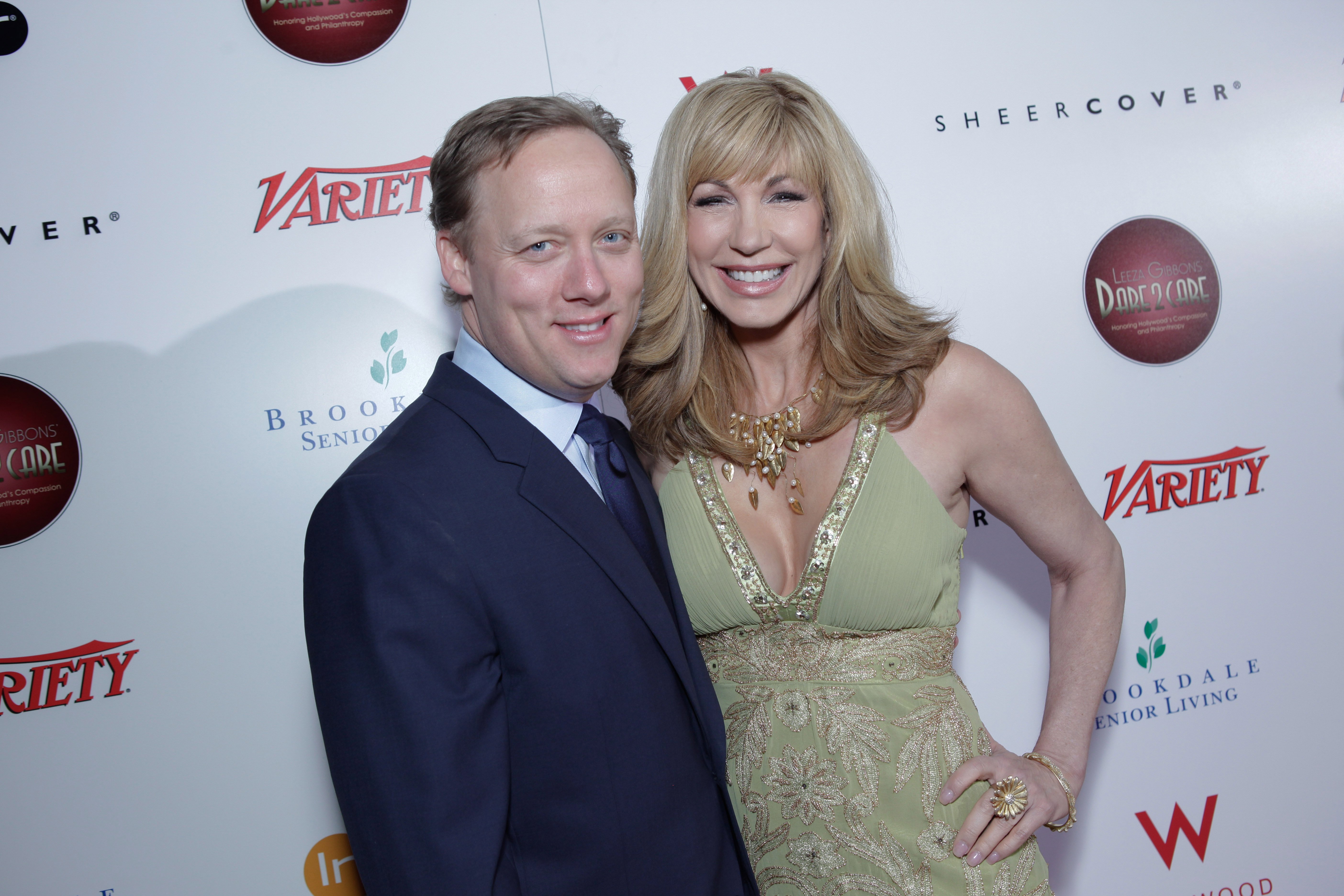 Steven Fenton and Leeza Gibbons are photographed at the Leeza Gibbon's Dare 2 Care Benefit at BOA Steakhouse on February 24, 2011, in West Hollywood | Source: Getty Images