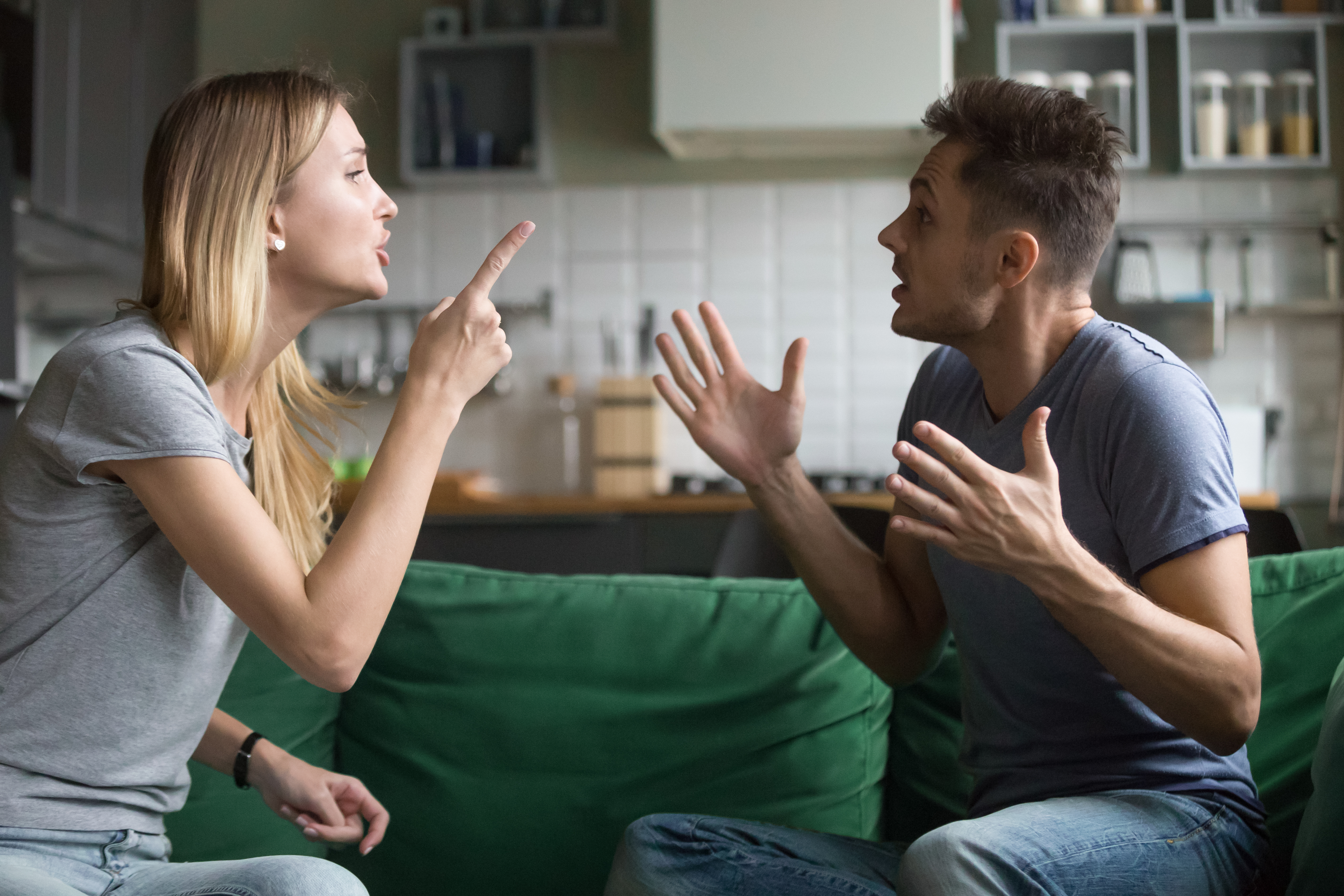 A couple arguing at home | Shutterstock