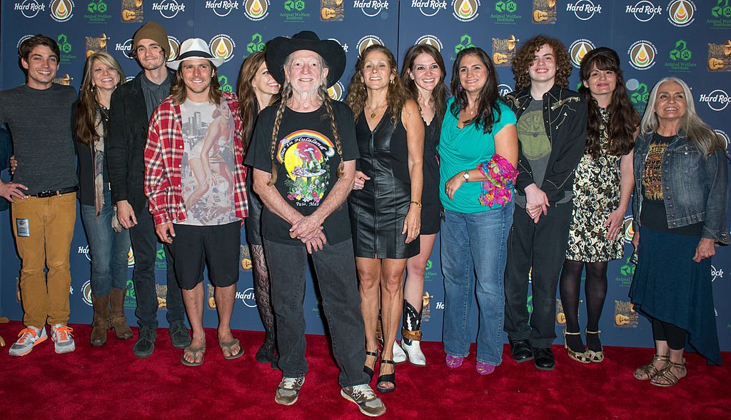 Trevor Nelson, Paula Nelson, Jacob Micah Nelson, Lukas Nelson, Amy Nelson, Willie Nelson, Annie D'Angelo, Raelyn Nelson, Rachel Fowler, Dean Hubbard, Martha Fowler, and Lana Nelson attend Hard Rock International's Wille Nelson Artist Spotlight Benefit Concert at Hard Rock Cafe, Times Square on June 6, 2013. Image Credit: Getty Images