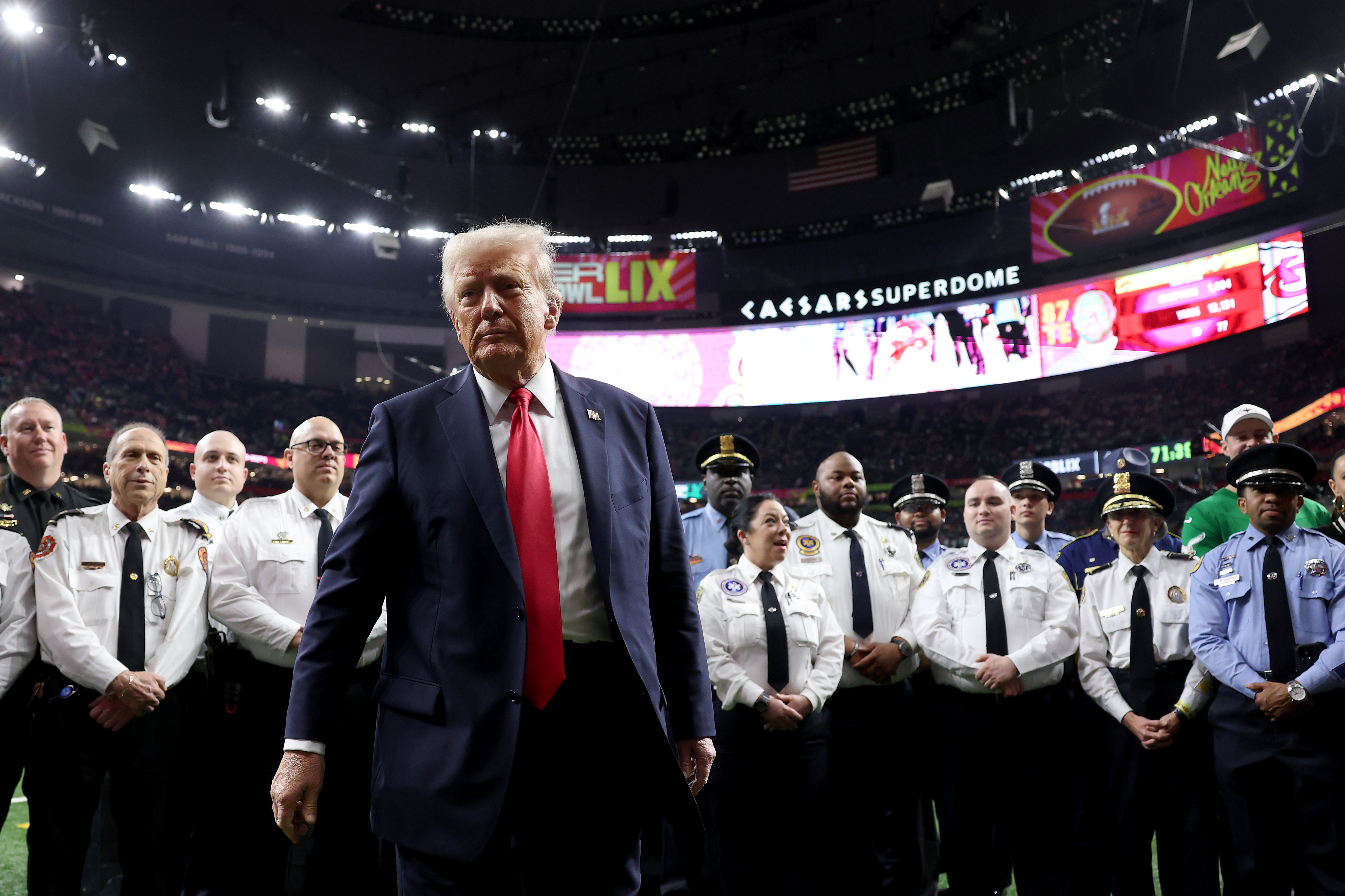 Donald Trump reacts after posing with family members of victims in the January 1 attack on Bourbon Street and emergency responders prior to Super Bowl LIX between the Kansas City Chiefs and the Philadelphia Eagles on February 9, 2025, in New Orleans, Louisiana | Source: Getty Images