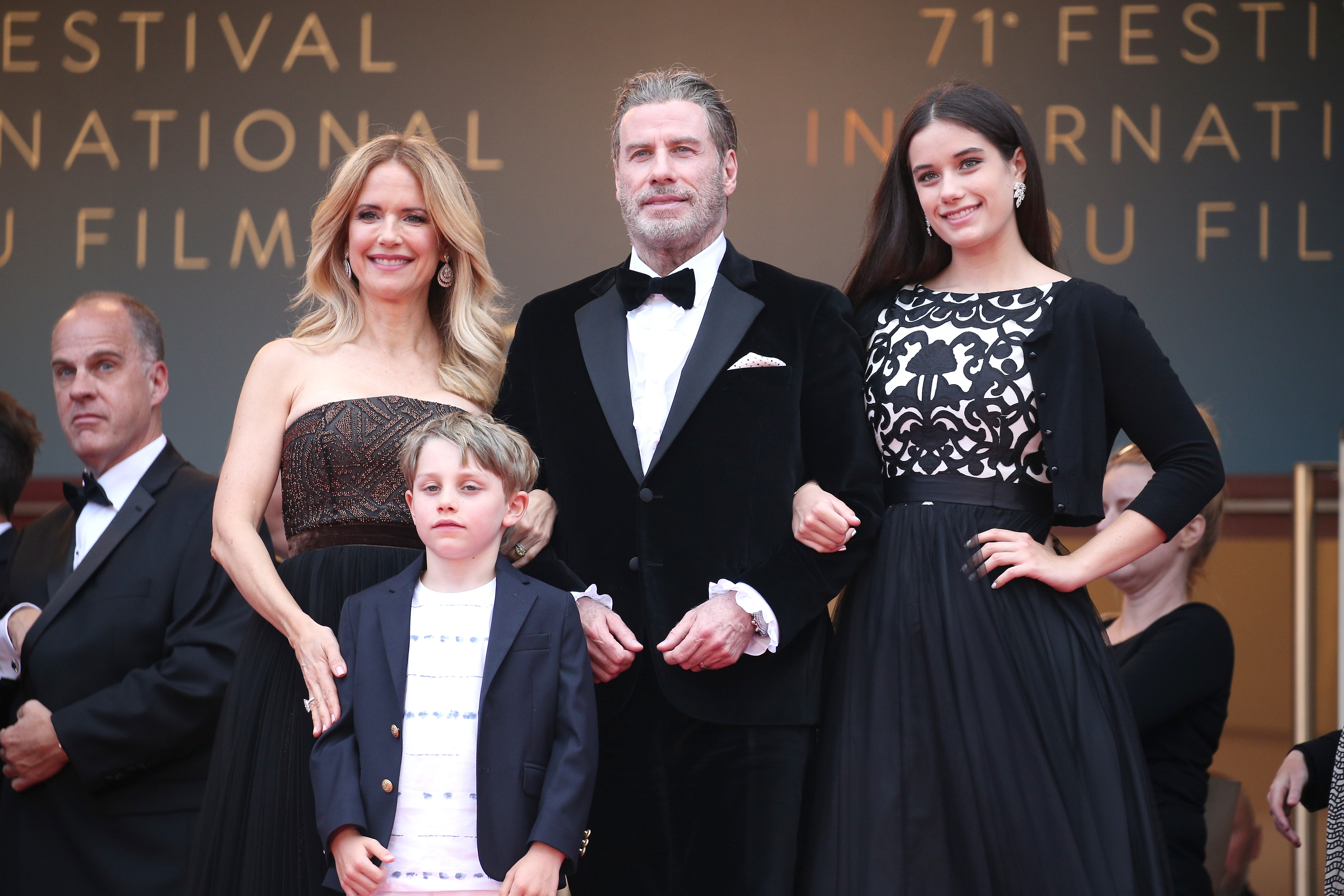 Kelly Preston (L) and John Travolta of "Gotti" pose with their children Ella Bleu (R) and Benjamin at the red carpet screening of "Solo: A Star Wars Story" during the 71st annual Cannes Film Festival at Palais des Festivals on May 15, 2018 in Canne, France. | Source: Getty Images