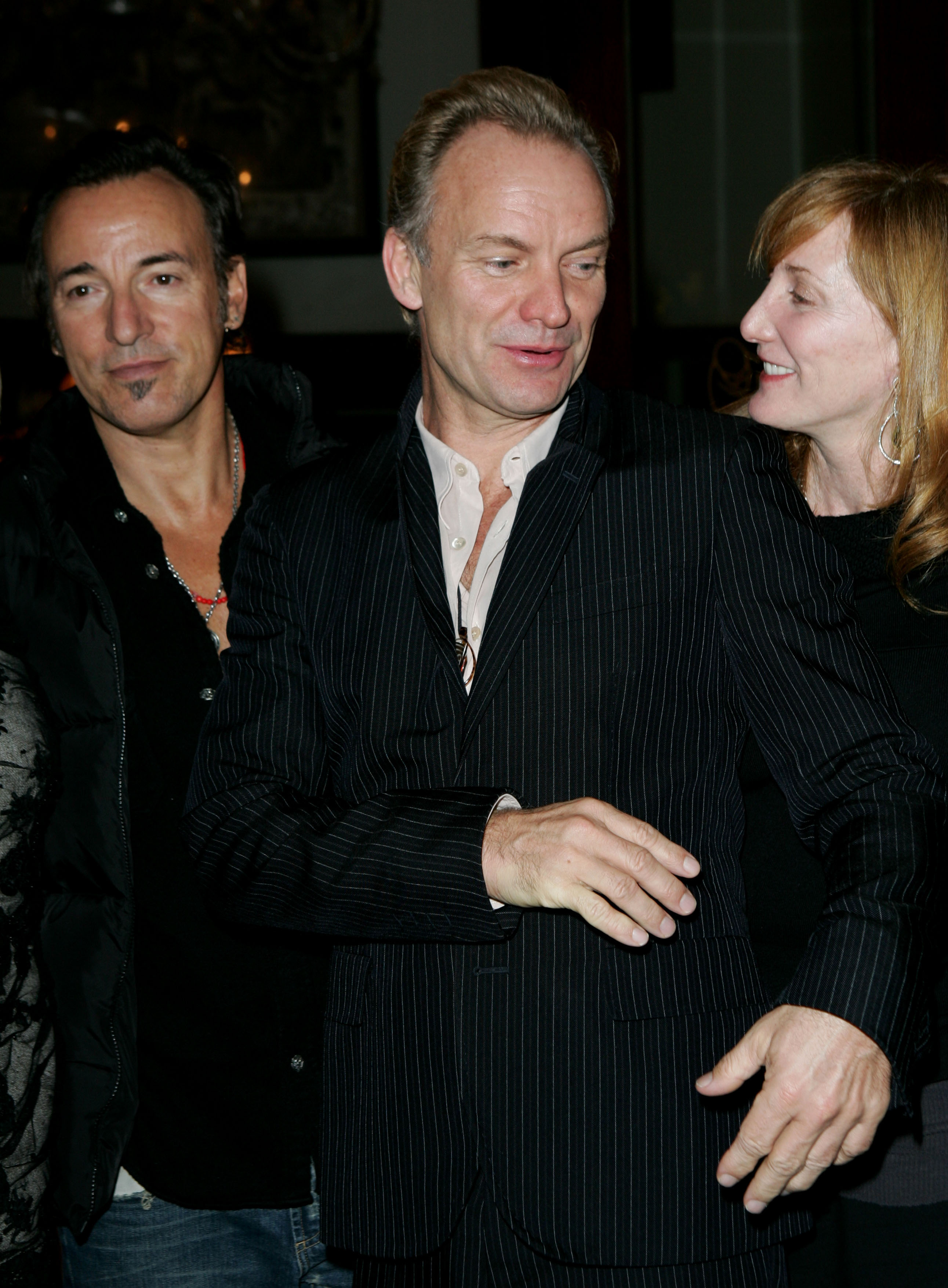 In this 2005 candid from New York City, Bruce Springsteen, Sting, and Patti Scialfa are spotted walking together during a rare public outing.