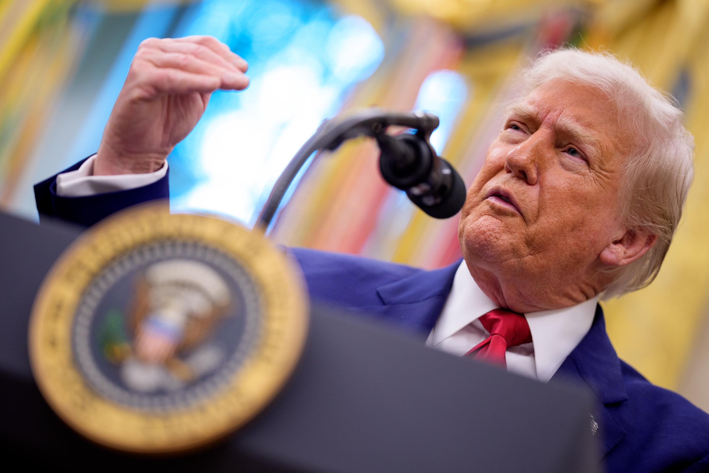 President Donald Trump speaking passionately to the press | Source: Getty Images