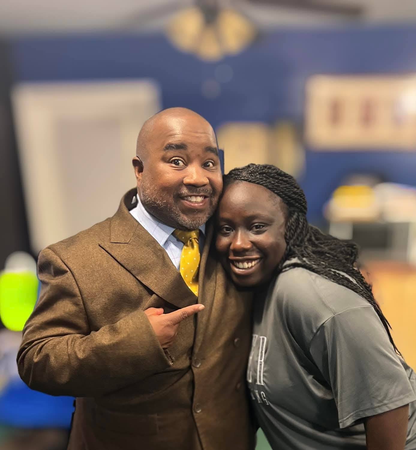 Riziki Ilenre and Pastor Walter D'Andre Green, from a post dated December 13, 2025 | Source: Facebook/Walter D'Andre Green