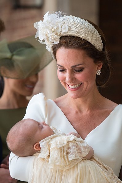 Catherine, Duchess of Cambridge carries Prince Louis as they arrive for his christening service at St James's Palace | Photo: Getty Images
