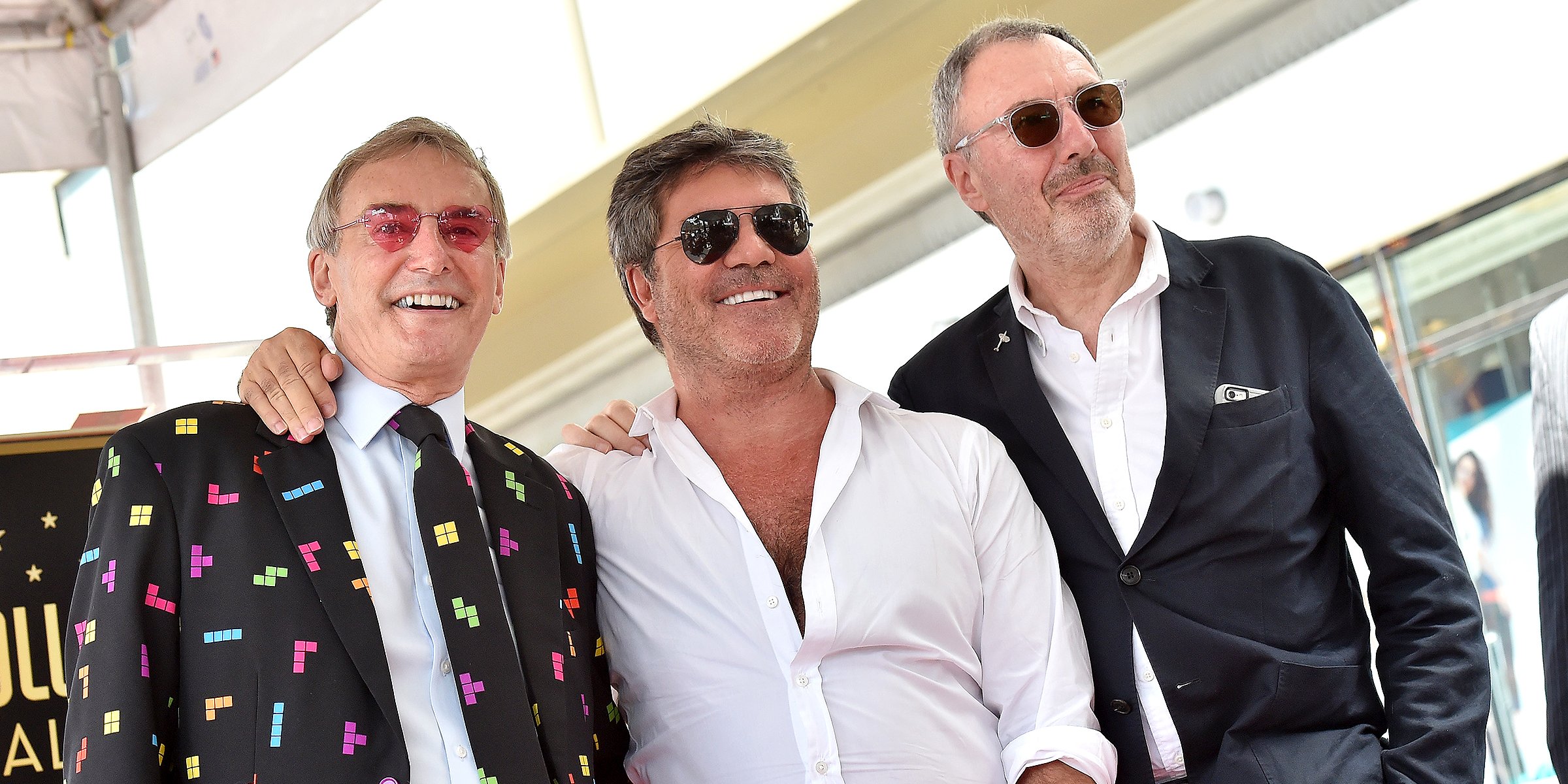 Simon Cowell with brothers Nicholas Cowell and Tony Cowell. | Source: Getty Images