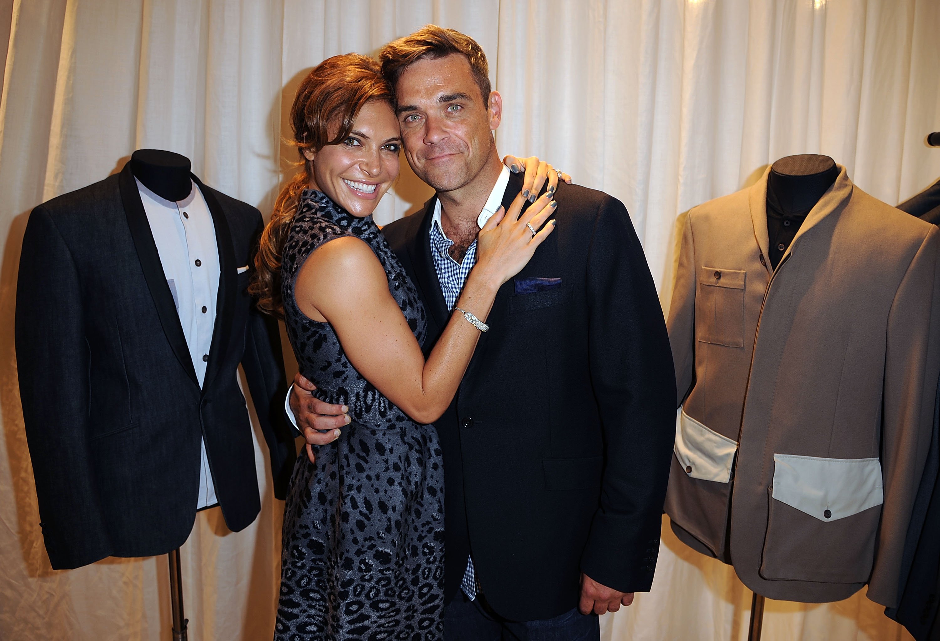 Robbie Williams and wife, Ayda Field, attend the launch of the Spencer Hart flagship store on September 16, 2011 in London, England | Source: Getty Images