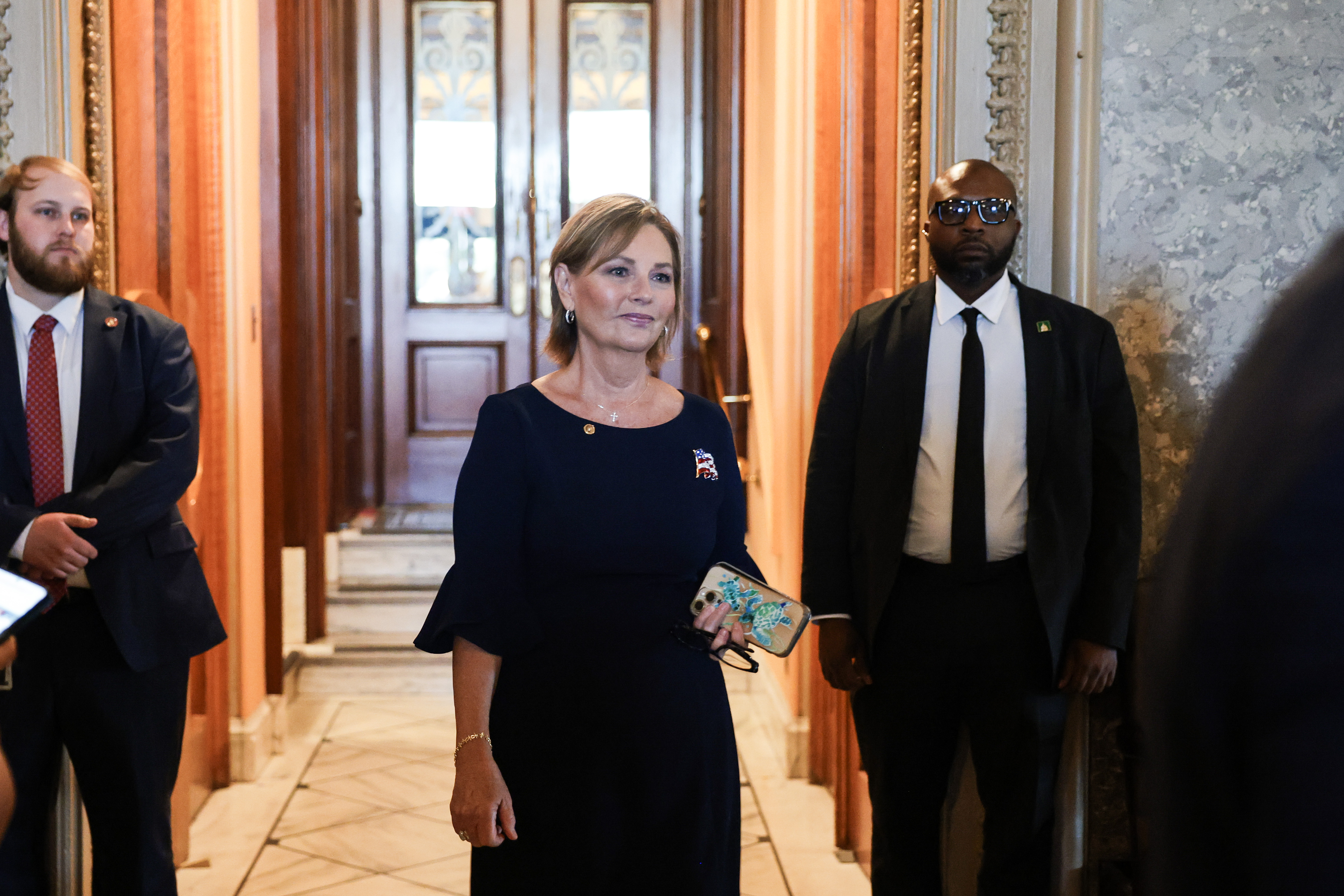Thrust into the fast-paced spotlight of Washington, newly appointed South Carolina Senator Darline Graham Nordone exits the Senate Chamber on July 20, 2026, as she navigates a whirlwind transition on Capitol Hill following her brother's tragic passing. | Source: Getty Images